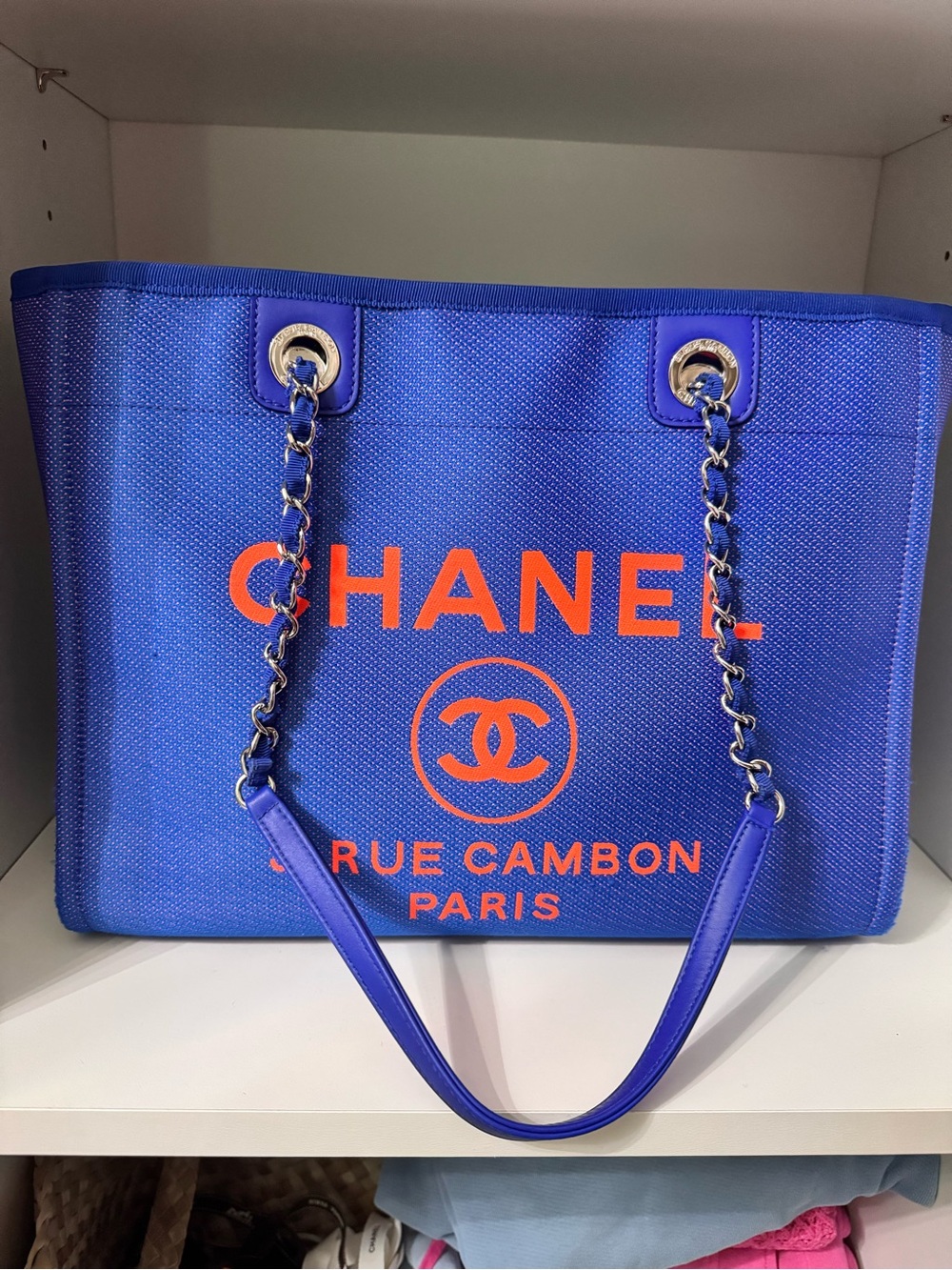 CHANEL Royal Blue Canvas Tote with Bright Orange Logo
